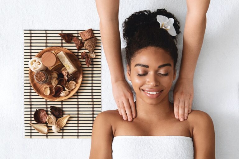 relaxed-african-american-woman-enjoying-body-massage-at-spa.jpg